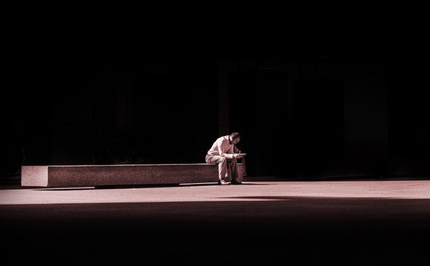 Image of Lone person on a bench