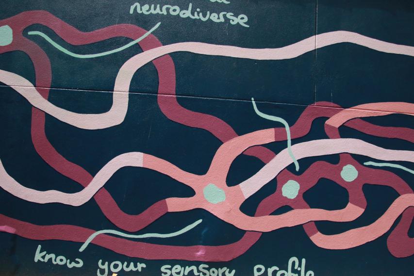 A street art mural that depicts the neural pathways of the brain.